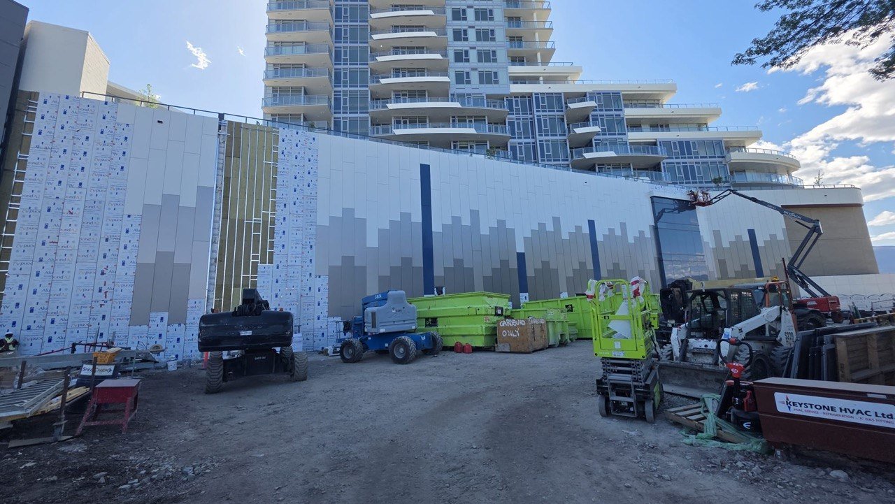 AQUA 2 completed facade with waterfront tower behind