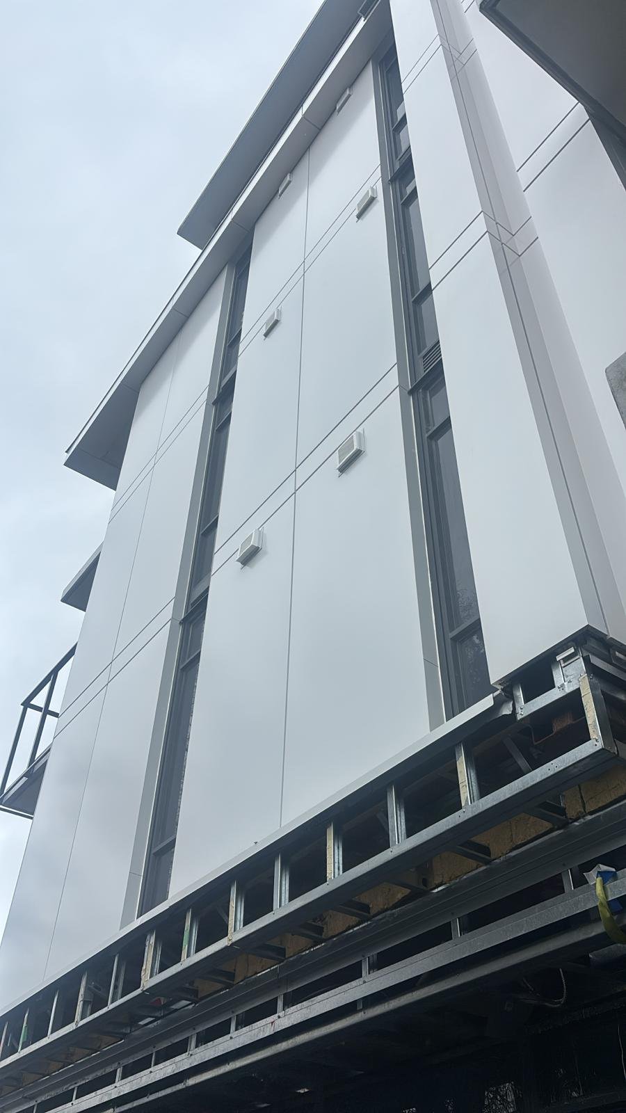 North Side white aluminium composite panel facade at Level 2